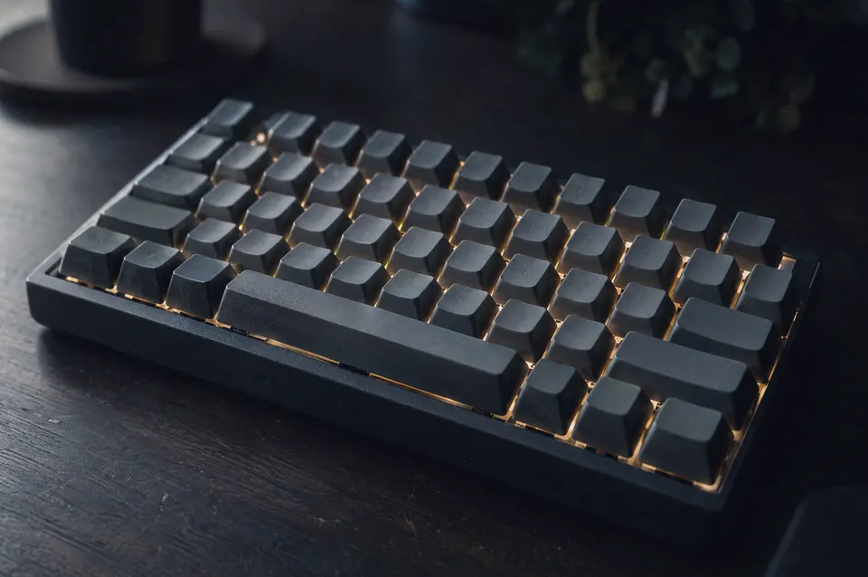 Illustration: Blank keycaps with warm light between them