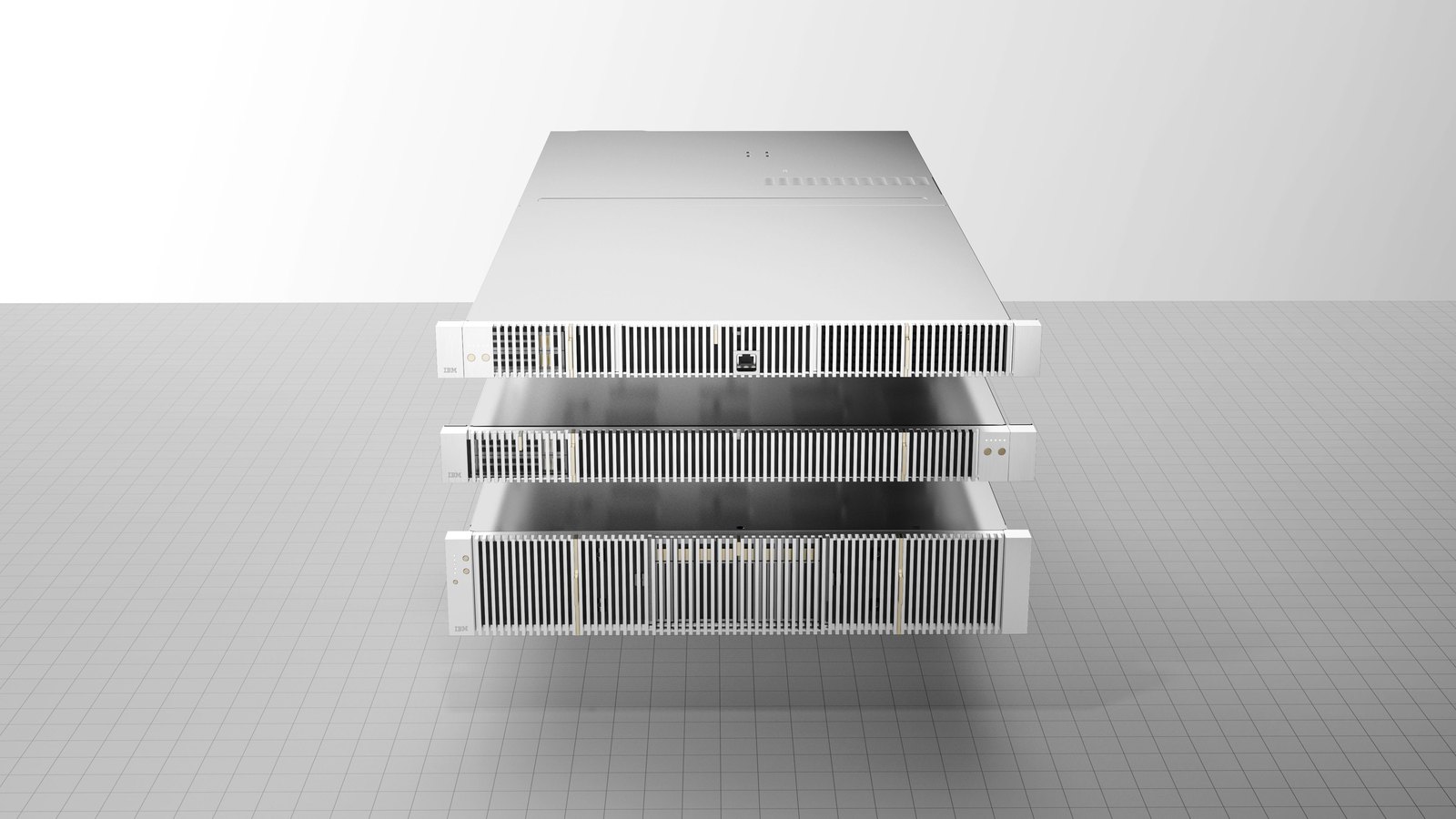A render of three plain 2U rack servers stacked on a white background, each front panel a wide ventilation grille, from IBM's NorthPole system materials.